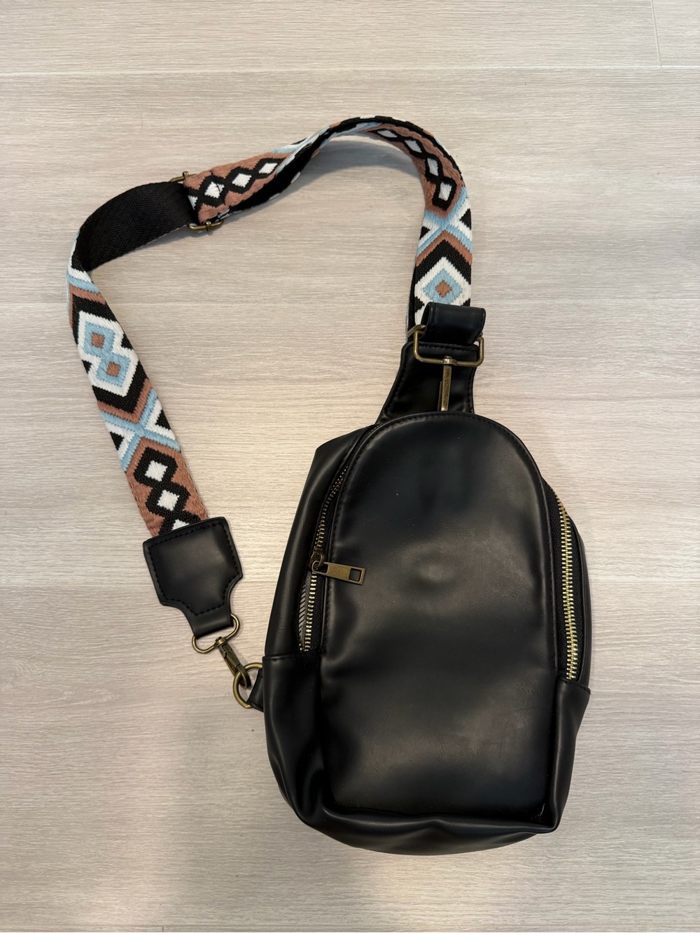 Black women’s Leather Crossbody Sling Bag with Patterned Strap